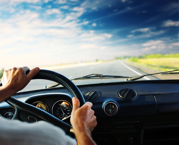 a man sitting in a car