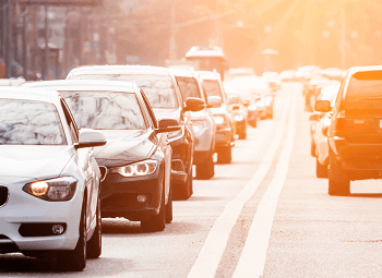 Cars driving on both sides of a road